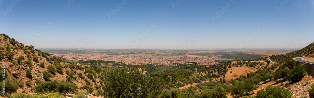 Beautiful panoramic view of the Moroccan city of Beni Mellal-Jenifra which is located between the Middle Atlas and the Tadla plain, in the center of Morocco. Concept landscape, city.