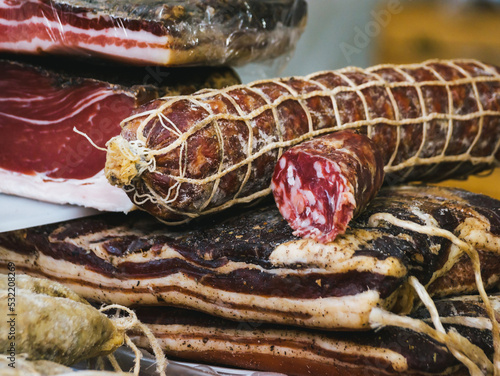 Obraz na plátně selling Italian cured meats. Italian salami close up