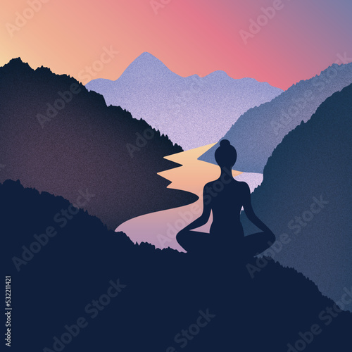 Silhouette of a woman meditating in the mountains at sunrise	