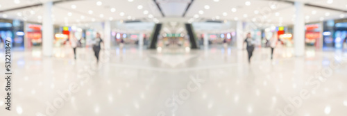 Abstract blur modern shopping mall interior background © Kwangmoozaa