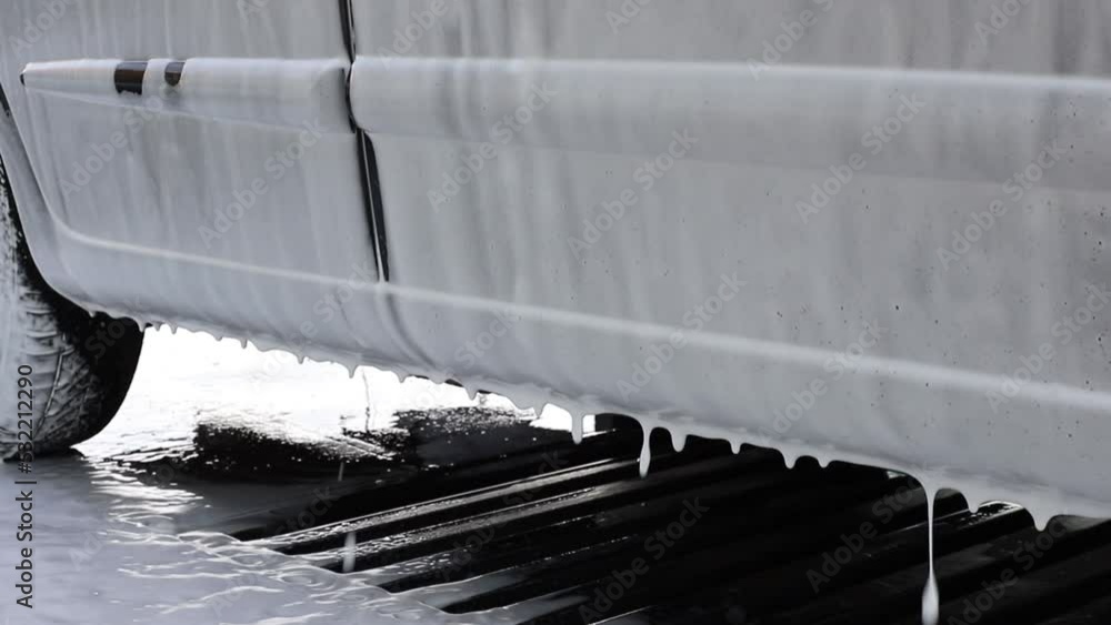 close-up machine dripping foam at the car wash close-up machine dripping foam at the car wash