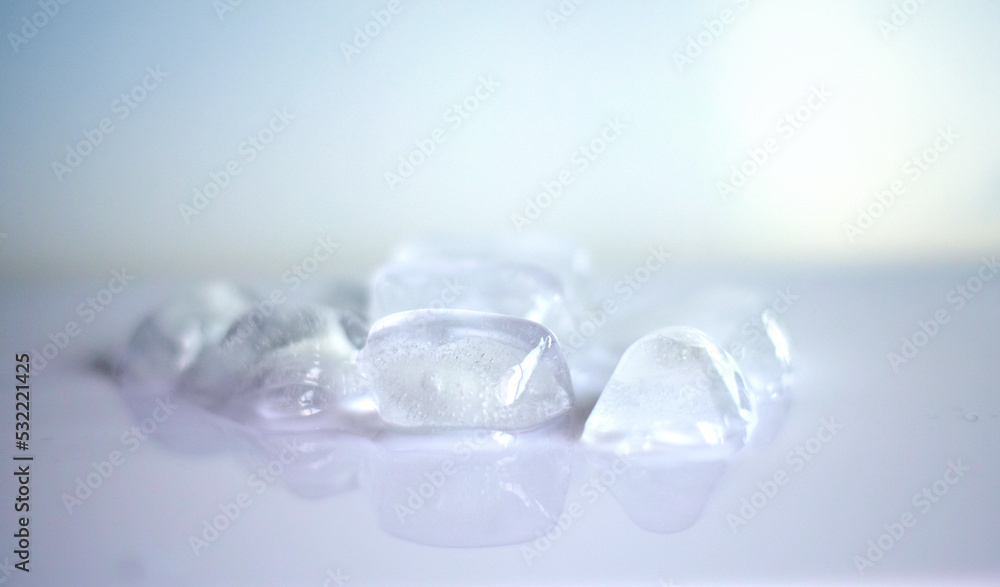 ice cubes, ice cubes melting on a soft background ice cubes, ice cubes melting on a soft background