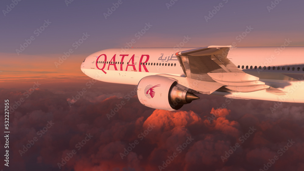 Boeing 777 Qatar Airways flying over the amazing sunset, 20 Sep, 2022, Doha, Qatar Stock Photo