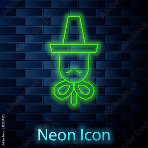 Glowing neon line Traditional korean hat icon isolated on brick wall background. Vector