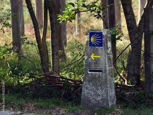 Milestone to Finisterre in the Camino de Santiago. One of the last stages in the jacobean way. photo