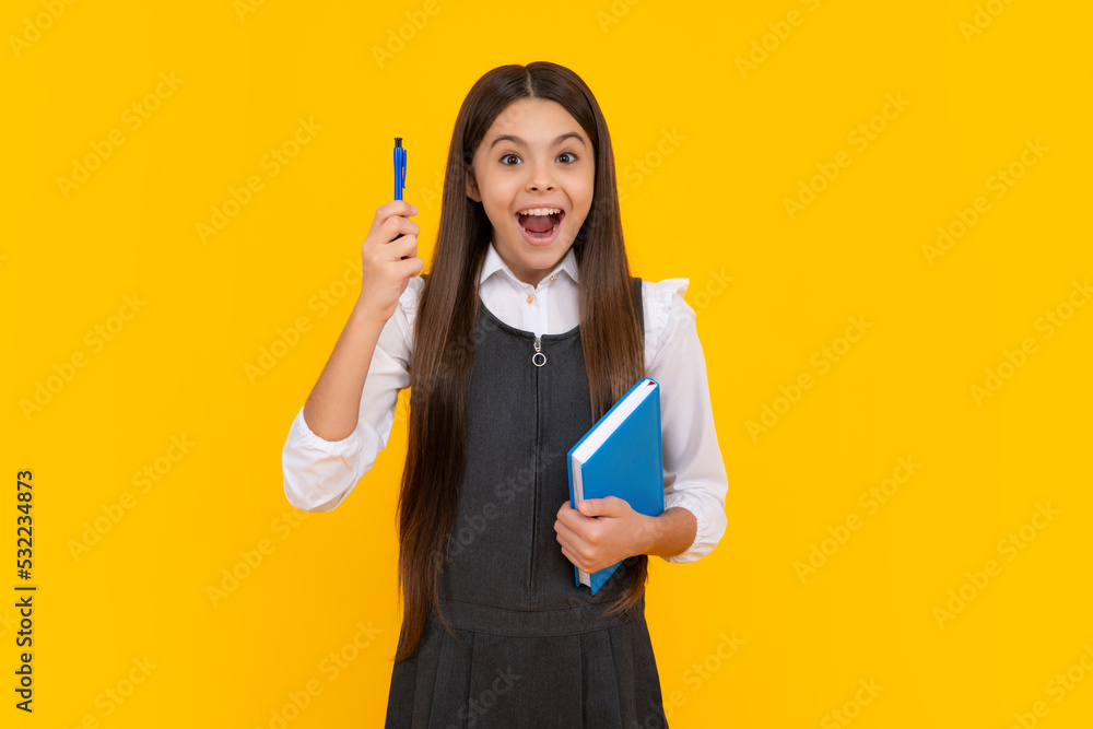 Amazed teen girl. Teenager school girl study with books. Learning knowledge and kids education concept. Excited expression, cheerful and glad. Amazed teen girl. Teenager school girl study with books. Learning knowledge and kids education concept. Excited expression, cheerful and glad.
