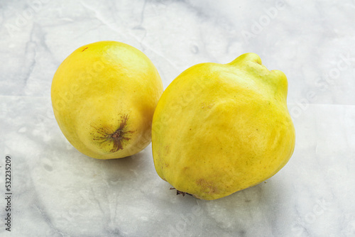 Fresh ripe yellow quince fruit