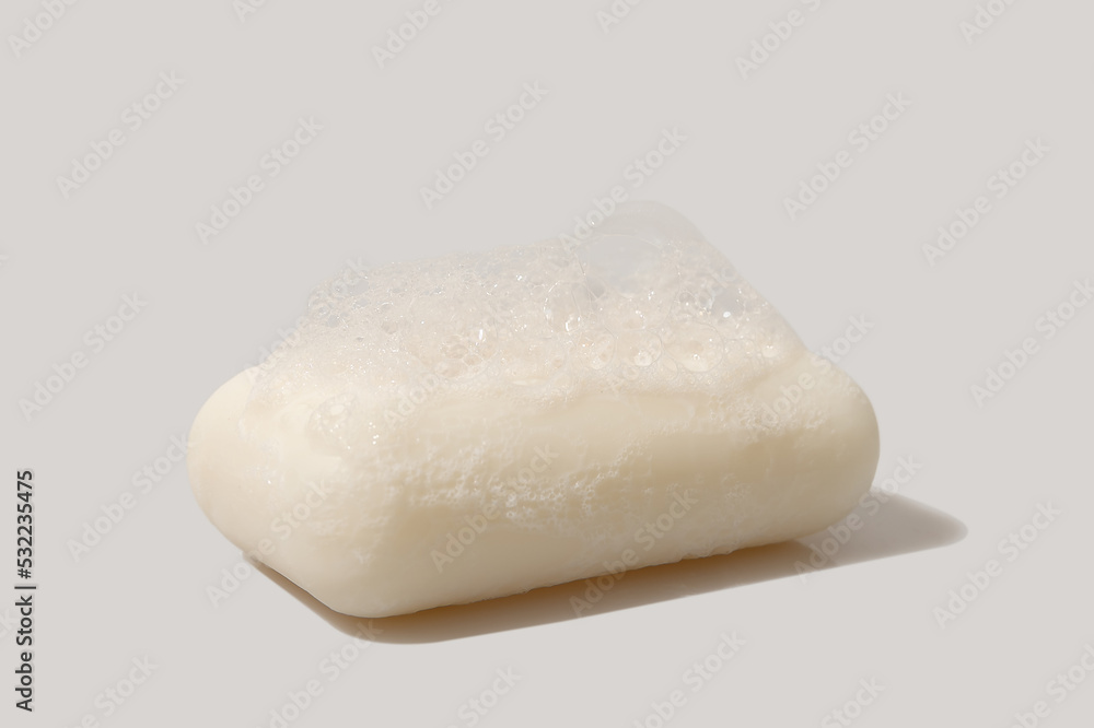 White soap with hard shadow. Detergent and body care. White soap with hard shadow. Detergent and body care.