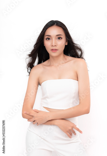 Portrait of Attractive Beauty Asian Women in Fashion Posing with Smiling Face Wearing White Dress on White Background for Cosmetic or Healthcare