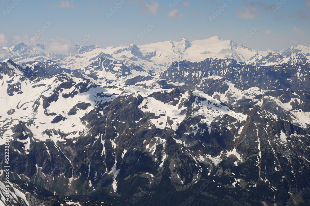 Fototapeta premium Panorama opening from Kitzsteinhorn, sky resort slope, Kaprun, Austria