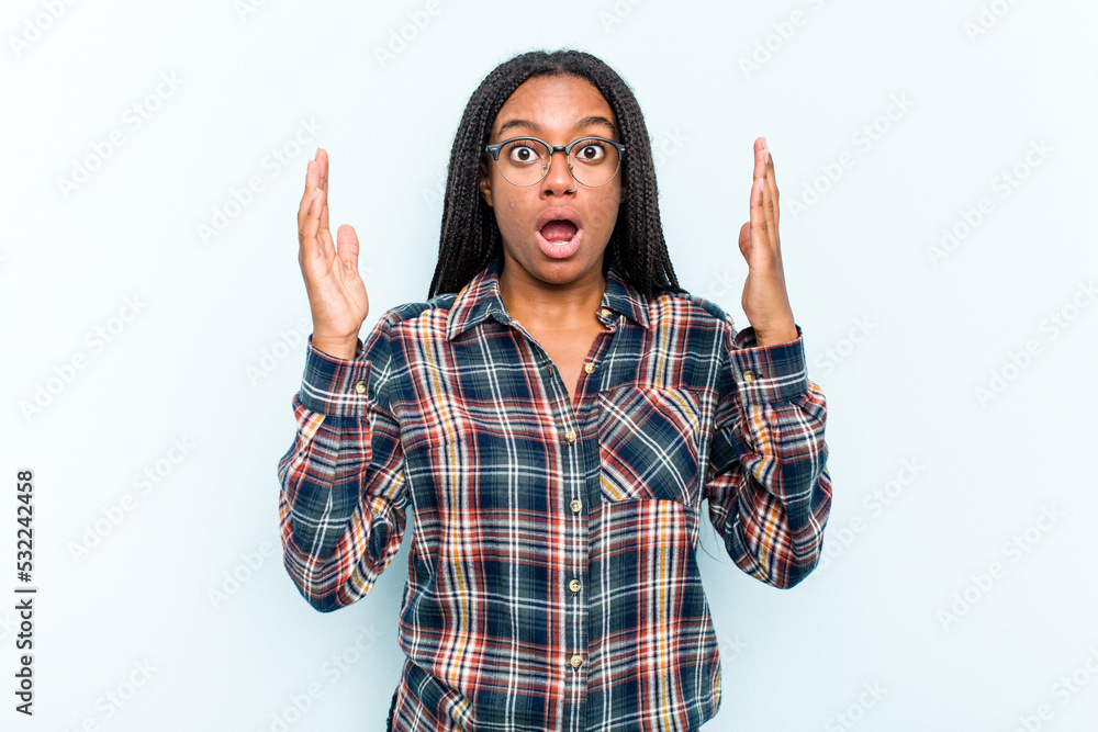 Young African American woman with braids hair isolated on blue background having an idea, inspiration concept. Young African American woman with braids hair isolated on blue background having an idea, inspiration concept.