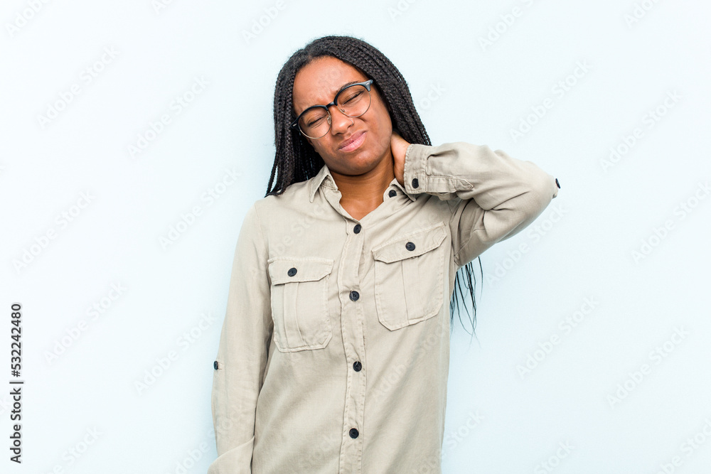 Young African American woman with braids hair isolated on blue ...