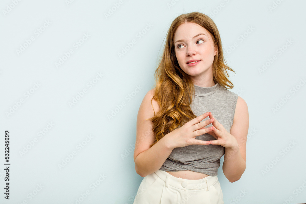 Young caucasian woman isolated on blue background making up plan in mind, setting up an idea. Young caucasian woman isolated on blue background making up plan in mind, setting up an idea.