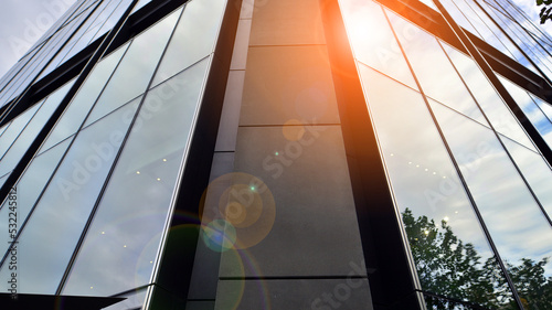 Wallpaper Mural Glass clad facade of a modern skyscraper covered in reflective plate glass. Torontodigital.ca