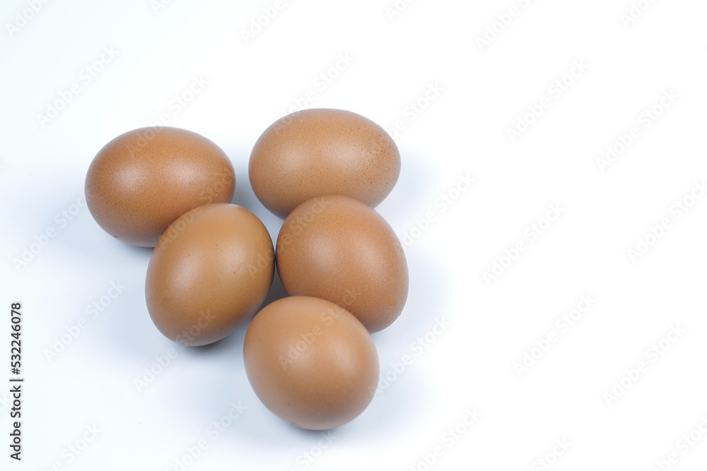 Small group of Chicken eggs on white background. Top view Small group of Chicken eggs on white background. Top view