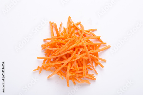 Grated carrot on white