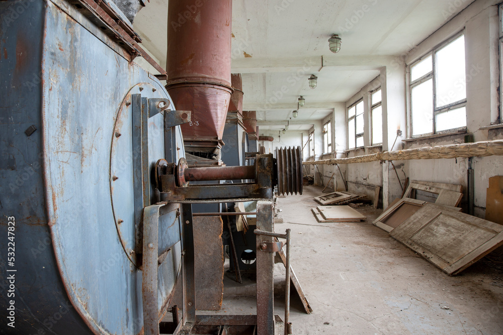 An old abandoned hall with ventilation equipment