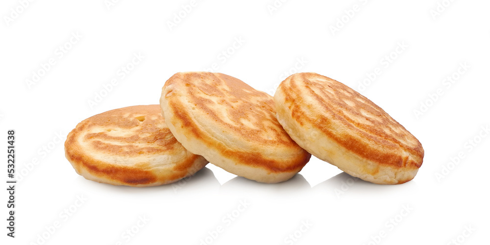 Three thick fluffy pancakes isolated on white background  