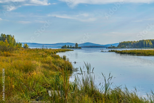 Autumn landscape sunset on the river bank. Wonderful nature  beautiful natural background.