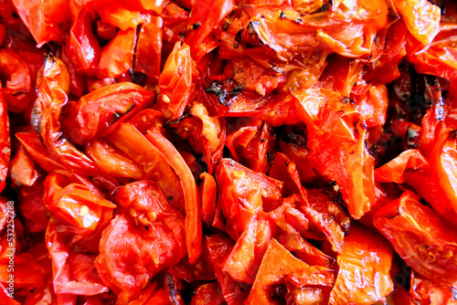 Obraz na plátne Close up of San Marzano and Roma Italian  tomatoes roasted in the oven prior to