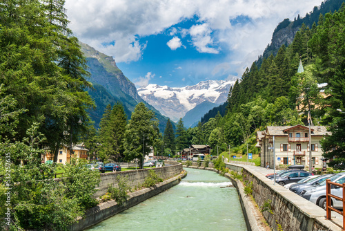 view of the Lys river course with the background of Monte Rosa in Gressoney-Saint-Jean, Aosta Valley, Italy  photo