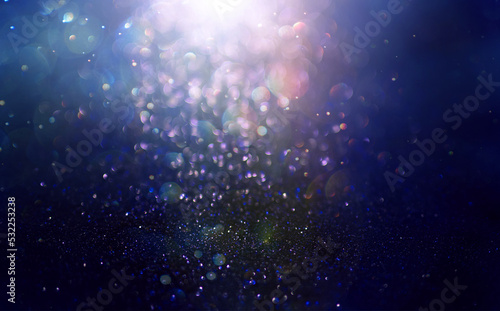 Abstract background of  glitter lights. De-focused background.  © Miha Creative