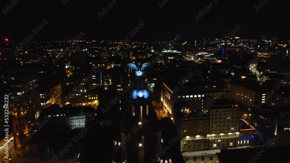 Aerial drone view of Liverpool city and port at night, United Kingdom