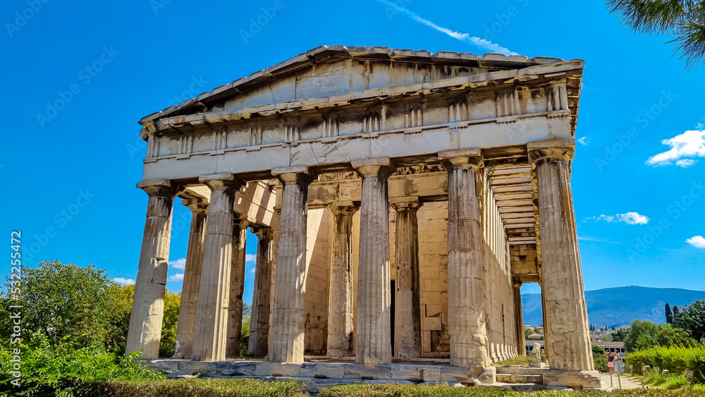 Fototapeta premium Scenic view of the temple of Hephaestus and Athena Ergane Agora, Athens, Attica, Greece, Europe. Ruins of ancient agora, birthplace of democracy and civilisation. Building dedicated to greek gods