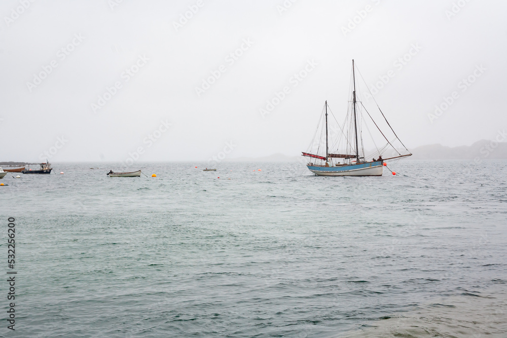 Obraz premium UK, Isles of Mull and Iona - September 8, 2019: casual photos of live style and architecture on the islands at cloudy weather