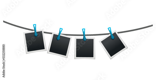Photo frames hanging on rope attached with clothes pins or clothespin. Blank instant photo card icons isolated on white background