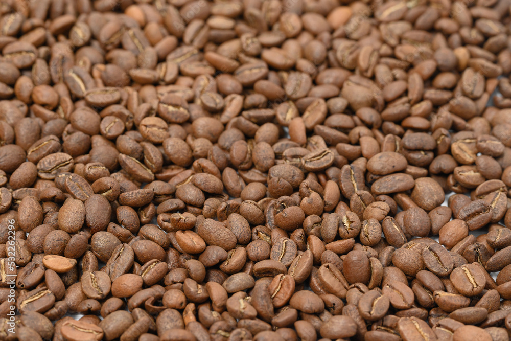 Spilled roasted coffee beans, place for Copy space. Spilled roasted coffee beans, place for Copy space.