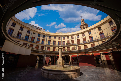 View of the emblematic Plaza Redonda or Plaça Redona in the heart of the old town of Valencia, a must-see in the city photo