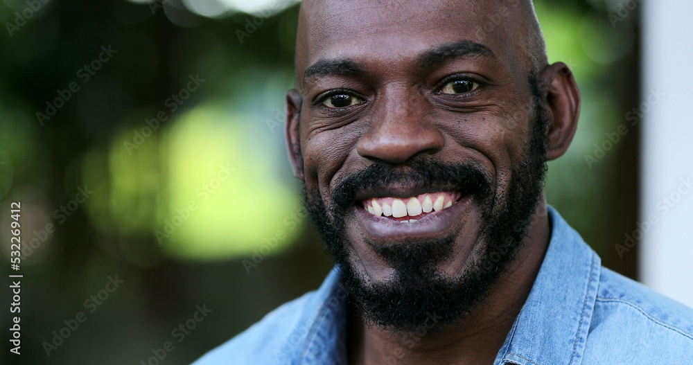 Fototapeta premium Confident black African man smiling portrait