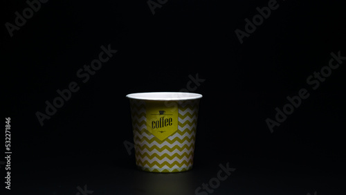 coffee paper cup on black background