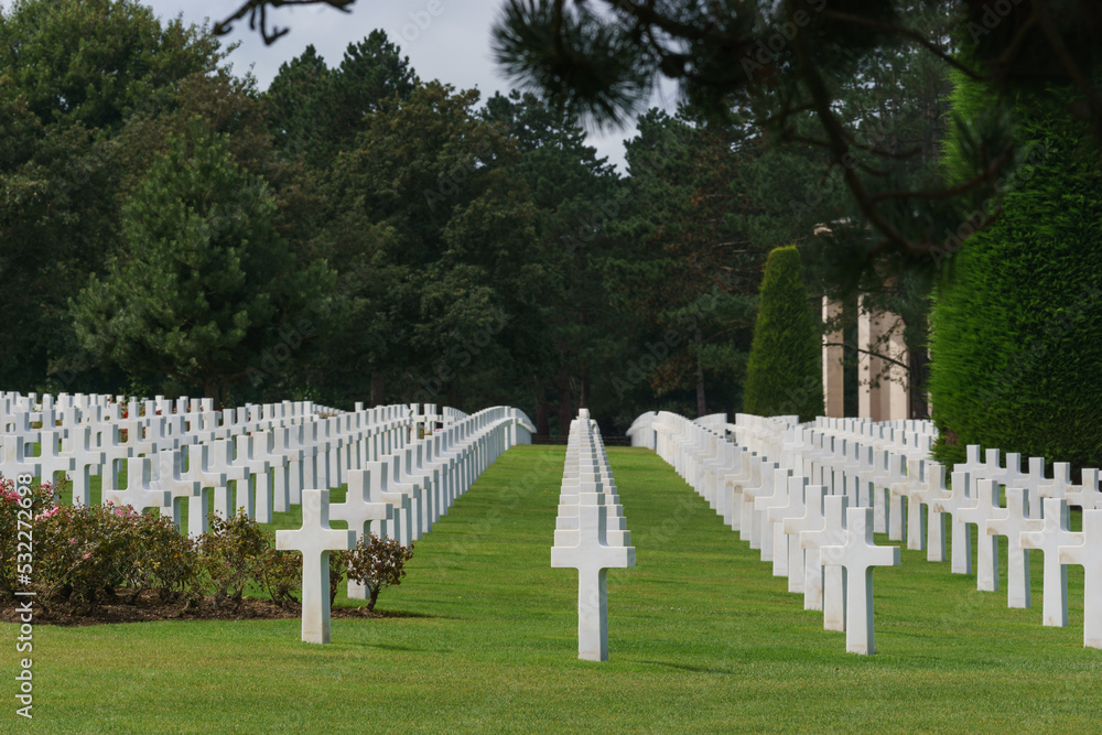 Rows of white crosses of fallen american soldiers at American War Cemetery at Omaha Beach Cimetiere Americain, Colleville-sur-Mer, Normandy, France