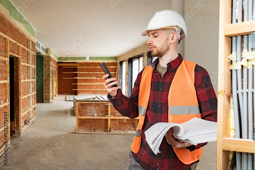 Builder man. Worker with ph...