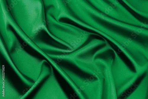 Green satin fabric as background