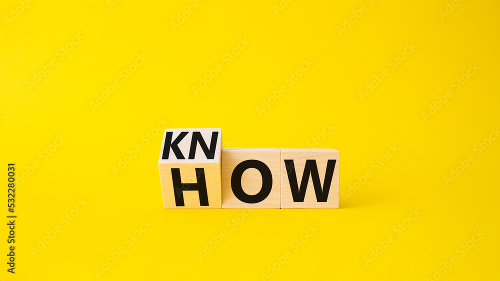 Know how symbol. Turned wooden cubes with words How and Know. Beautiful yellow background. Business and Know how concept. Copy space. Know how symbol. Turned wooden cubes with words How and Know. Beautiful yellow background. Business and Know how concept. Copy space.