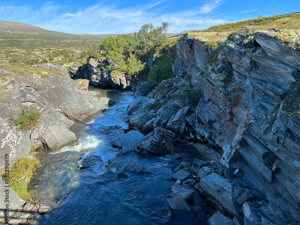 Obraz premium Waterfall inside Dovre National Park, Norway, Scandinavia, Europe