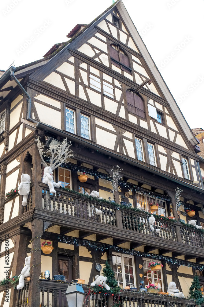 Strasbourg, France. Example of half-timber architecture from the medieval era. Building is decorated with Christmas.