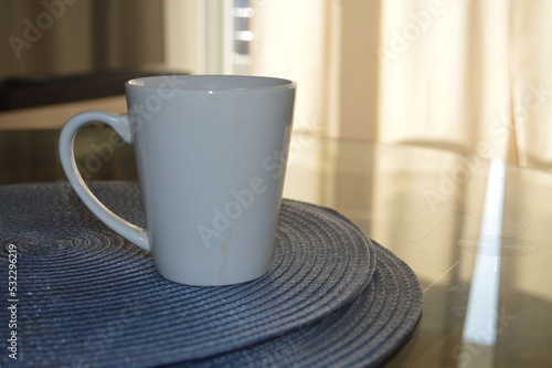 Fototapeta Naklejka Na Ścianę i Meble -  
WHITE CUP OF COFFEE