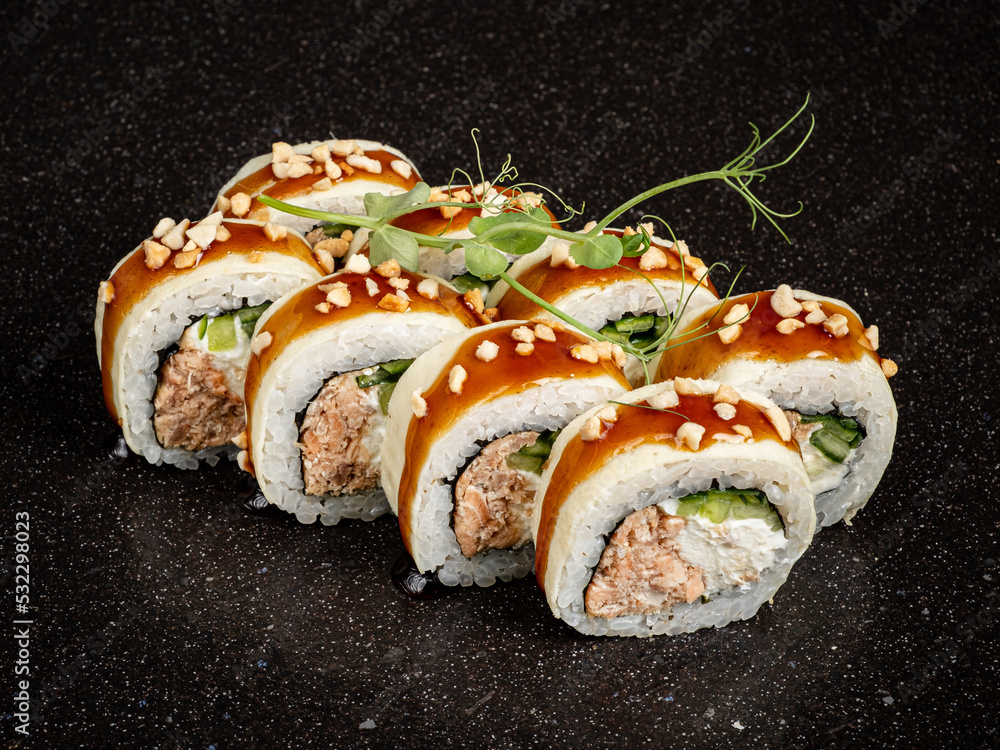 tasty sushi on the black background tasty sushi on the black background