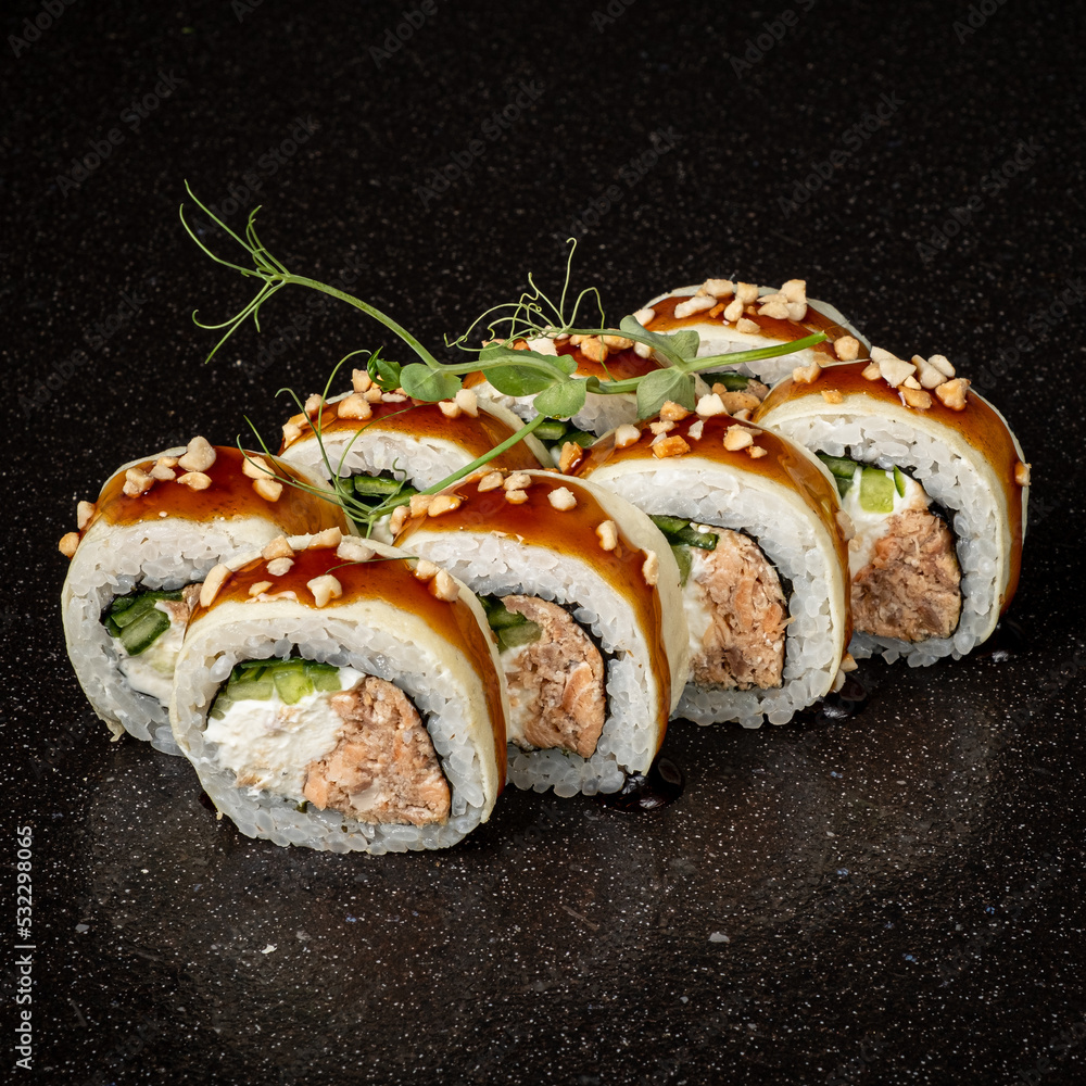 tasty sushi on the black background tasty sushi on the black background