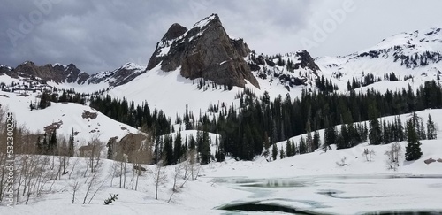 Lake Blanche and Sundial Peak in the snow, Wasatch National Forest in Utah photo