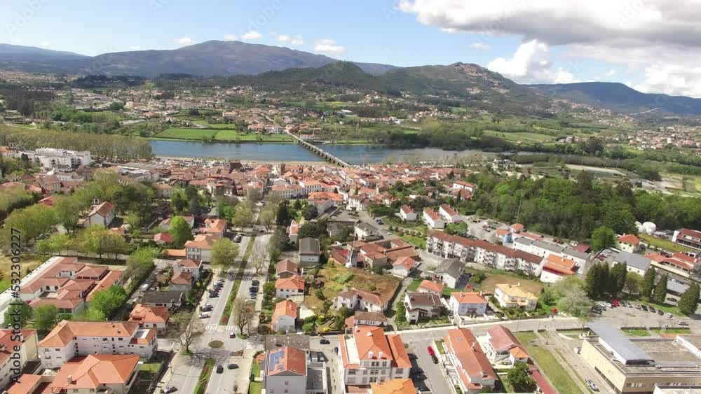 City of Ponte de Lima Aerial View. Flying Over River Lima. Cloudy Day. Portugal 4k. Tratel Destination City of Ponte de Lima Aerial View. Flying Over River Lima. Cloudy Day. Portugal 4k. Tratel Destination