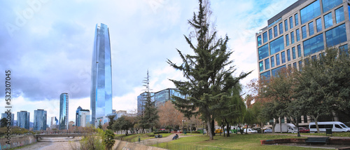 Cityscape during grey winter day, Santiago, Chile. Costanera skycraper on background photo