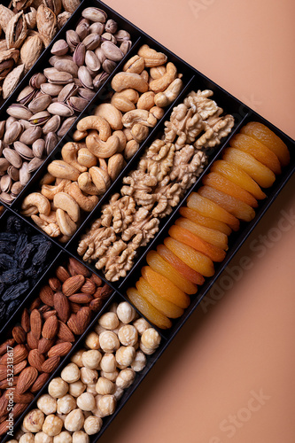 Nuts and dried fruits in a black box.