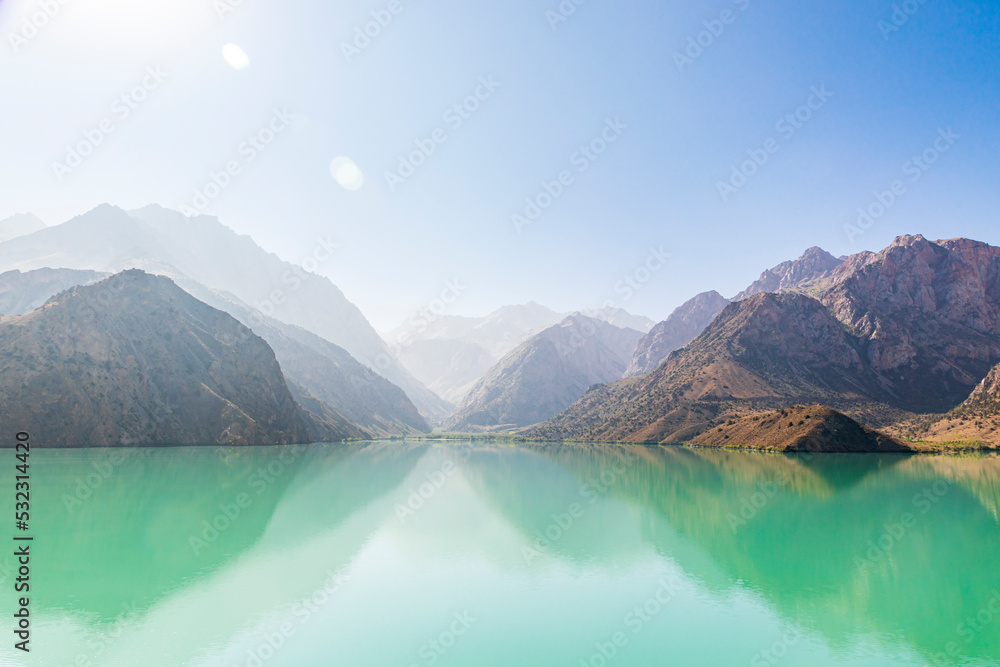 Iskanderkul, Sughd Province, Tajikistan. Misty mountains above Iskanderkul Lake.