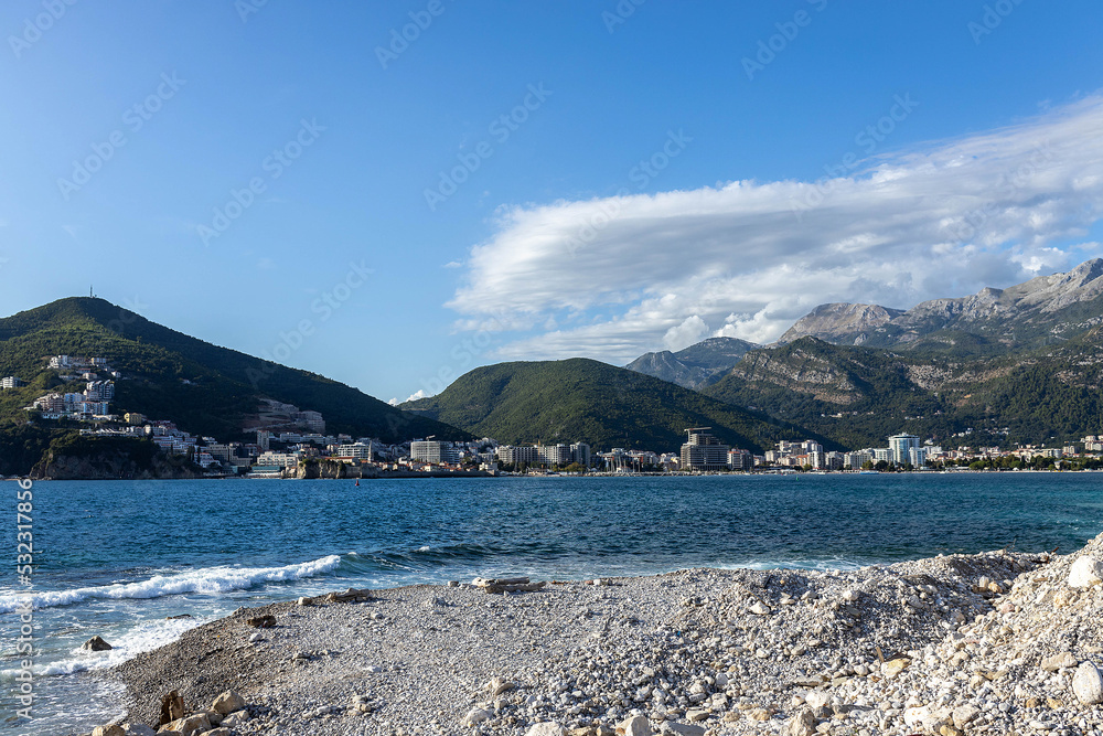 Coastline scenery View from Exotic beach Sveti Nikola island to the budva riviera. the main excursion site Montenegro, Adriatic sea, Europe. Paradise beach on an island in the sea. High quality photo. Coastline scenery View from Exotic beach Sveti Nikola island to the budva riviera. the main excursion site Montenegro, Adriatic sea, Europe. Paradise beach on an island in the sea. High quality photo.
