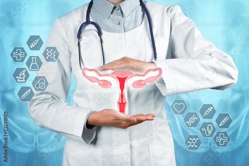 Doctor holding virtual image of uterus and different icons on light blue background, closeup photo